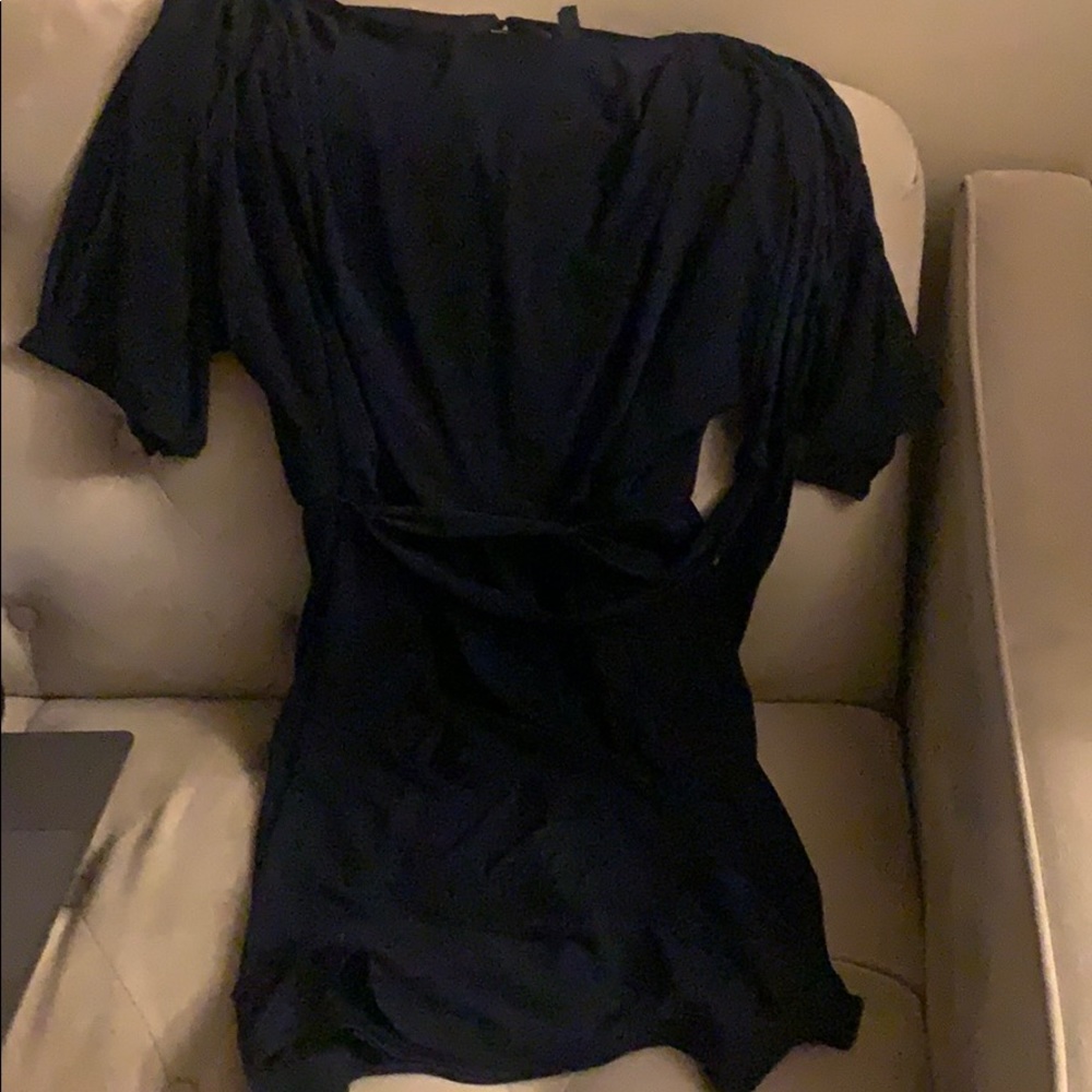 a navy blue knee length dress